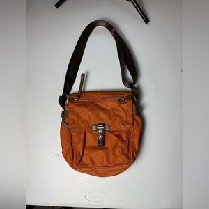 Tumi orange crossbody bag with brown leather accents preppy workwear